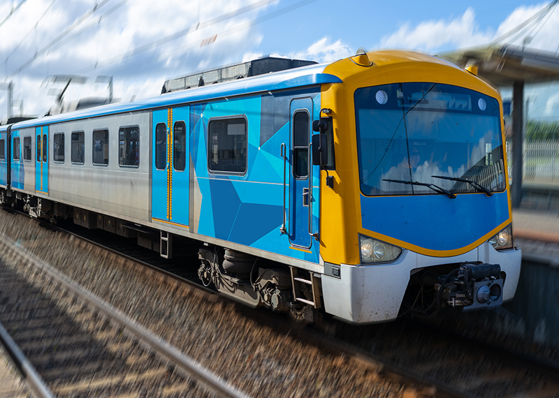 Commuter train approaching a train station in Melbourne Victoria Australia